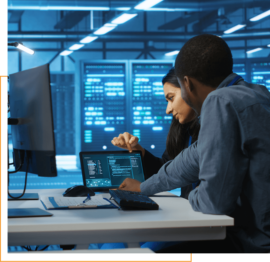 Diverse team of engineers looking at parameters in data center on tablet